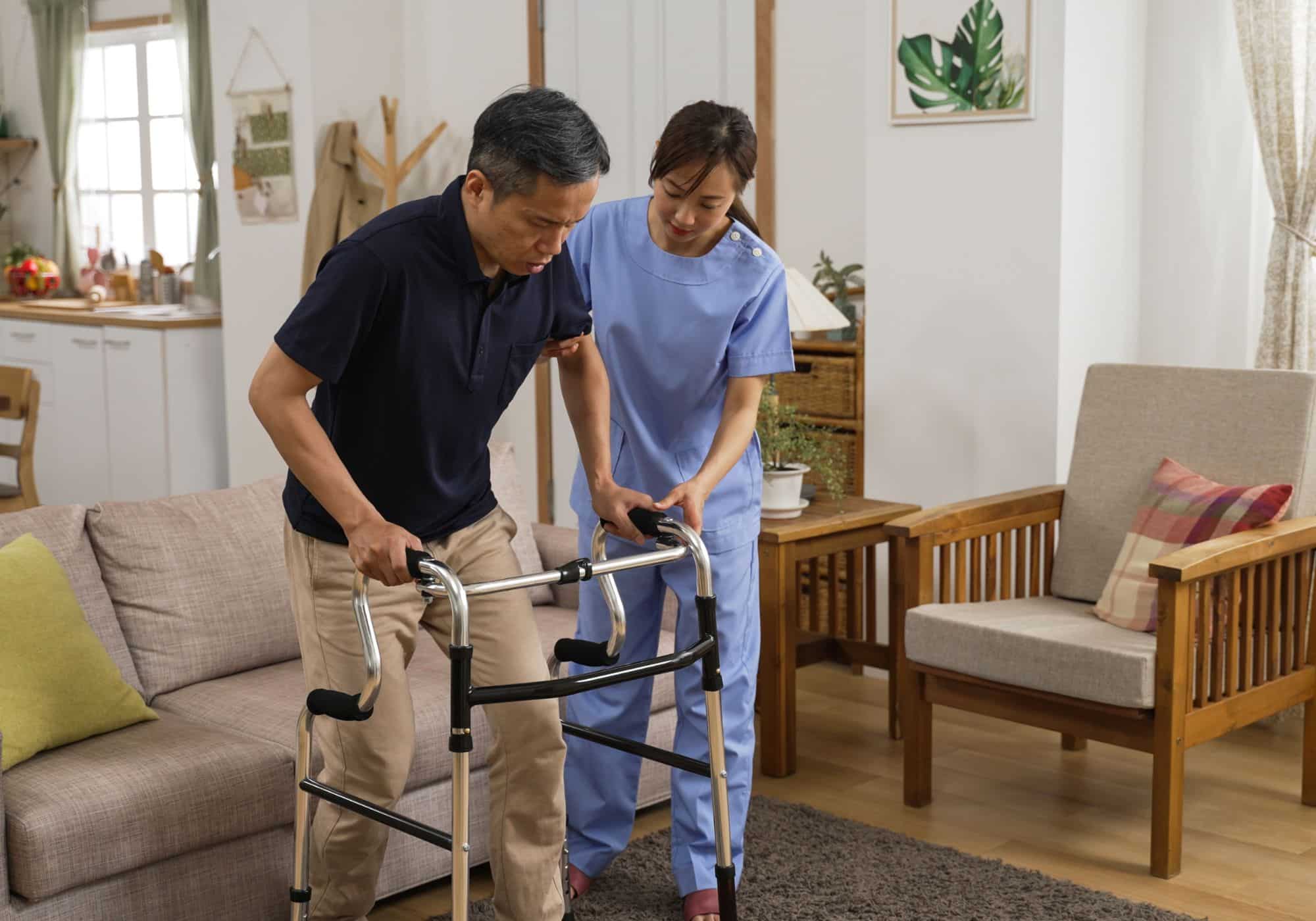 a man helping a woman with a walker
